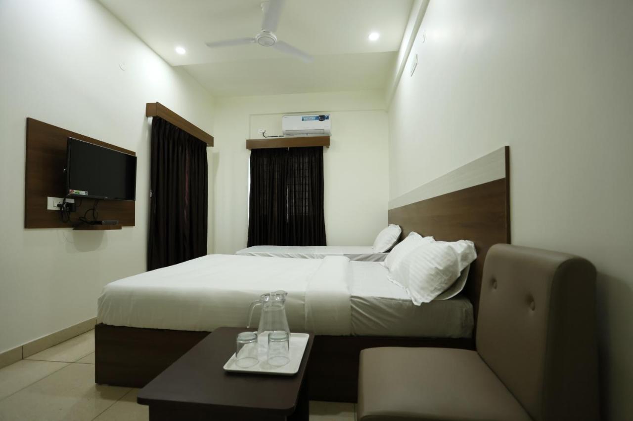 Hotel Sigma Suites Бангалор Экстерьер фото
